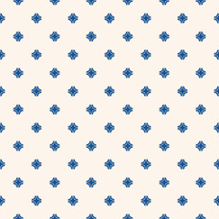 Vector geometric floral seamless pattern. Simple minimalist texture. Abstract indigo blue and white graphic background. Minimal ornament with small flower silhouettes, stars, crosses. Repeat design