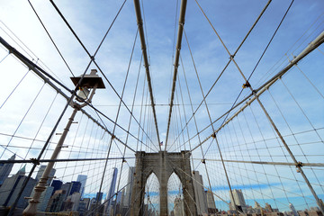 Brooklyn Bridge cable web with overlook on Manhattan