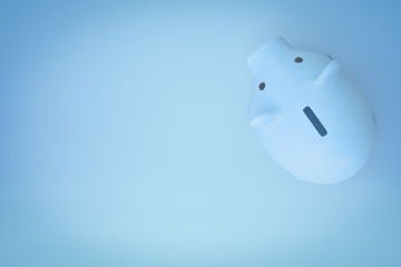 3d rendering of blue piggy bank on blue background, view from above.