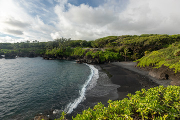 Fototapeta na wymiar Black sand beach in Maui