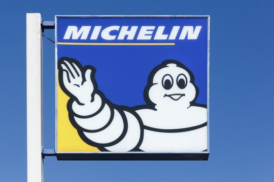Lyon, France - September 21, 2015: Michelin logo on a pole. Michelin is a tire manufacturer based in Clermont-Ferrand in France and it is one of the three largest tire manufacturers in the world