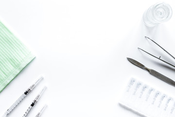 instruments of gynecologist on white background top view mock up