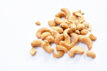 roasted salty cashew nuts arranging on white background