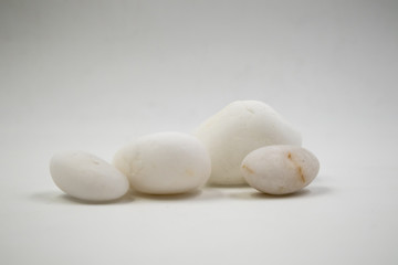Fototapeta na wymiar small rocks isolated in white background
