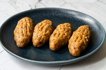 Bosnian Dessert Dudove with Sherbet from Bosnia / Kalburabasti.