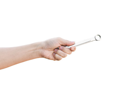 Hand holding a spanner isolated on a white background with clipping path.