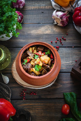 Roast in a clay pot. Braised beef with vegetables. A dish of Georgian cuisine. Chanahi