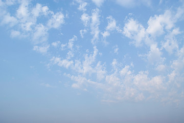 blue sky with white clouds on summer day background.