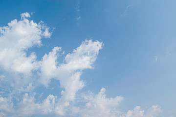 blue sky with natural white clouds. background summer sky.