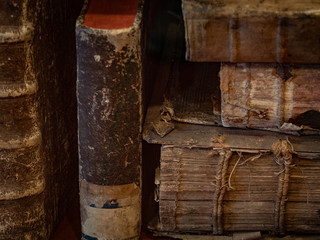 The ancient and vintage books in a bookcase