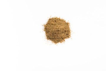 Spice mix for cooking fish macro crushed isolated on white background closeup