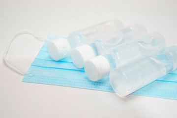 face mask and hand sanitizer