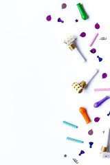 Colored party confetti on white background top view mockup
