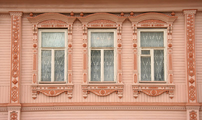 Russian traditional wooden windows with platband in Kineshma, Russia