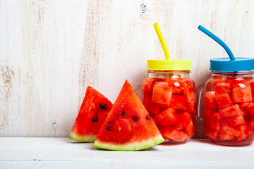Two cans with watermelon