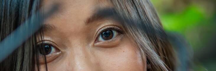 The eyes of a young Thai woman
