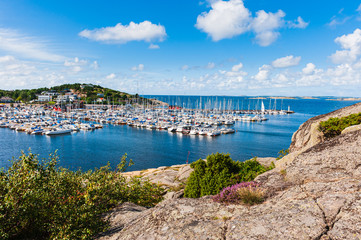 Fototapeta na wymiar Harbor with boats at coast, Sweden.