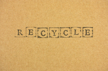 Cardboard with word Recycle