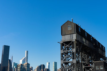 An Old Gantry with the Manhattan Skyline at Gantry Plaza State Park in Long Island City Queens