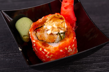 Assorty of sushi and roll, serve with red ginger and wasabi sauce