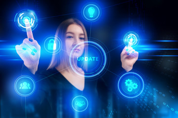 Business, Technology, Internet and network concept. Young businessman working on a virtual screen of the future and sees the inscription: Update