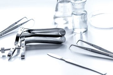 instruments of gynecologist on white background