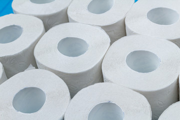lots of toilet paper rolls background close up. Isolation, quarantine covid-19 concept.