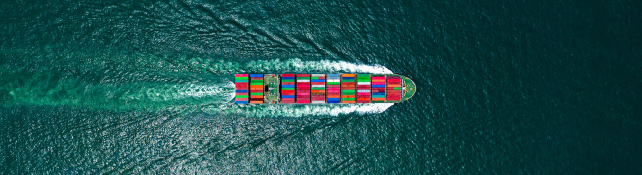 Aerial view container cargo ship in ocean, Business industry commerce global import export logistic transportation oversea worldwide, Sea shipping company vessel, copy space for web banner.