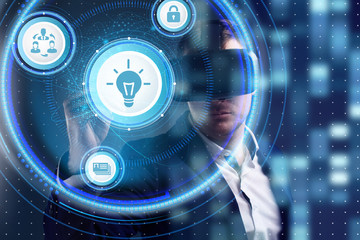Obraz premium Business, Technology, Internet and network concept. Young businessman working on a virtual screen of the future and sees the inscription: