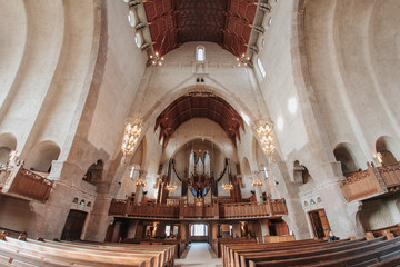 Engelbrekts church (Engelbrektskyrkan) was designed by architect Lars Wahlman in the National Romantic style and completed in 1914. It is one of the largest churches in Stockholm. April 2019, Stockhol