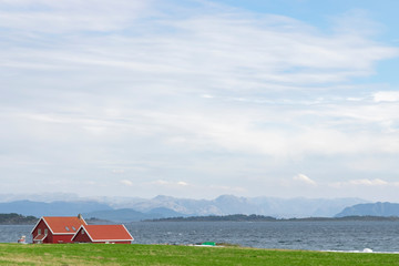 Norwegian house in the mountains by lake