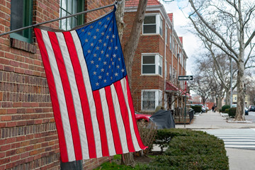 American Flag Hanging Outside of a Window of a Residential Building in Woodside Queens New York
