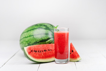 Close-Up Of  Watermelon-Watermelon Slices Against Wood White Background