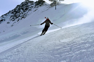Skiing girl in action