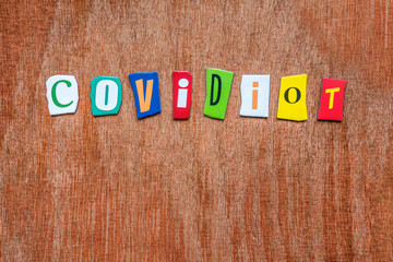 Covidiot, Do not be Covidiot, Covidiot inscription made with colorful letters. Coronavirus COVID-19...