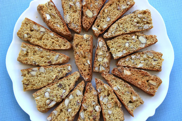 Plate of Italian almond biscotti seen from above
