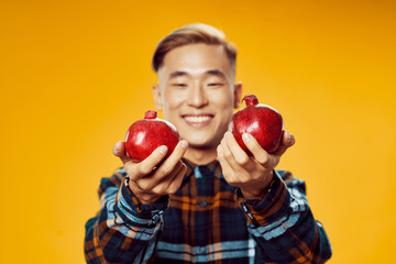 Fototapeta na wymiar young man with apple