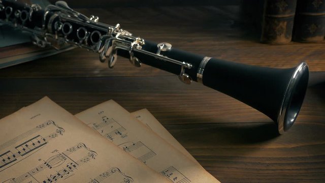Clarinet On Table With Books