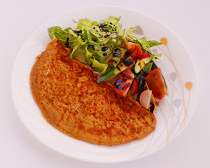 egg omelet with fresh mix vegetable salad, healthy concept