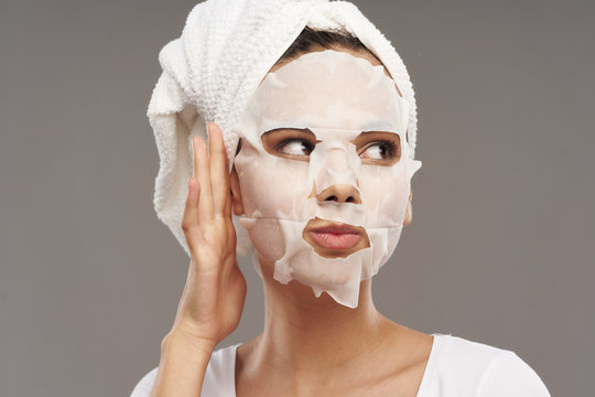 young woman with facial mask