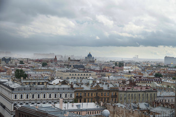 Top view of the city of St. Petersburg in Russia with ancient buildings and churches, the city in a foggy haze in front