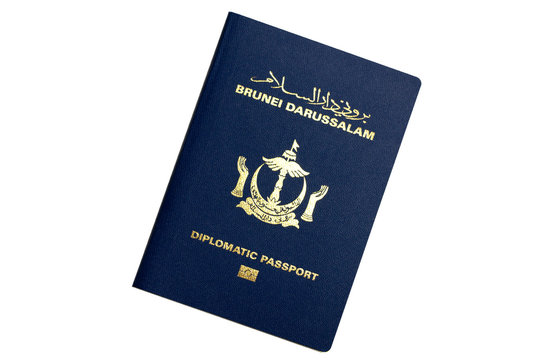 Blue diplomatic passport of Brunei Darussalam isolated on white background