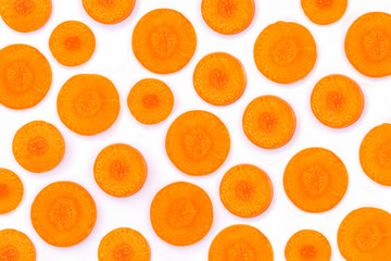 Fresh organic carrot slice isolated on white background. Top view. Flat lay. 