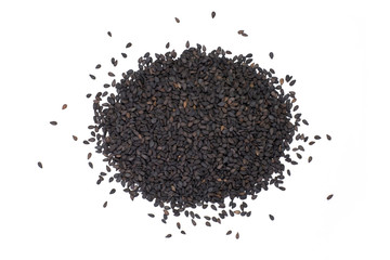 Closeup pile of balck sesame seeds isolated on white background. Top view.