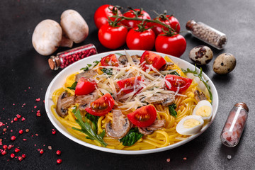 Spaghetti with mushrooms, cheese, spinach, rukkola and cherry tomatoes