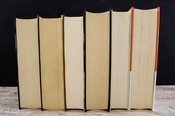 books on a wooden table. Close-up. Education concept.