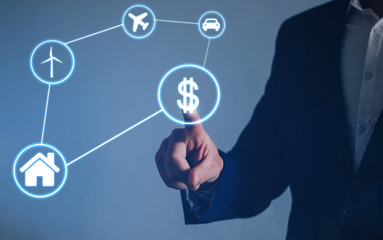 Businessman indicating suggestions for increasing profit with the help of money.
The concept of business development and its maintenance at a high level.
