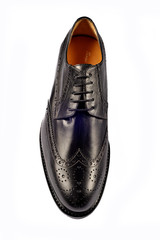 Fotografia di still liife di scarpe classiche su fondo bianco.