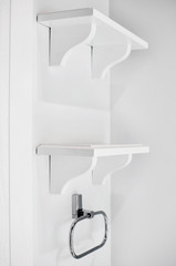 Modern white shelves on the wall. close-up