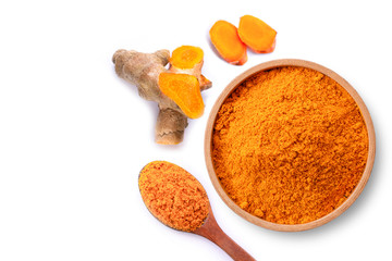 Turmeric powder ( known as curcumin, Curcuma longa Linn) in wooden bowl and spoon with tumeric rhizome isolated on white  background. Top view. Flat lay.